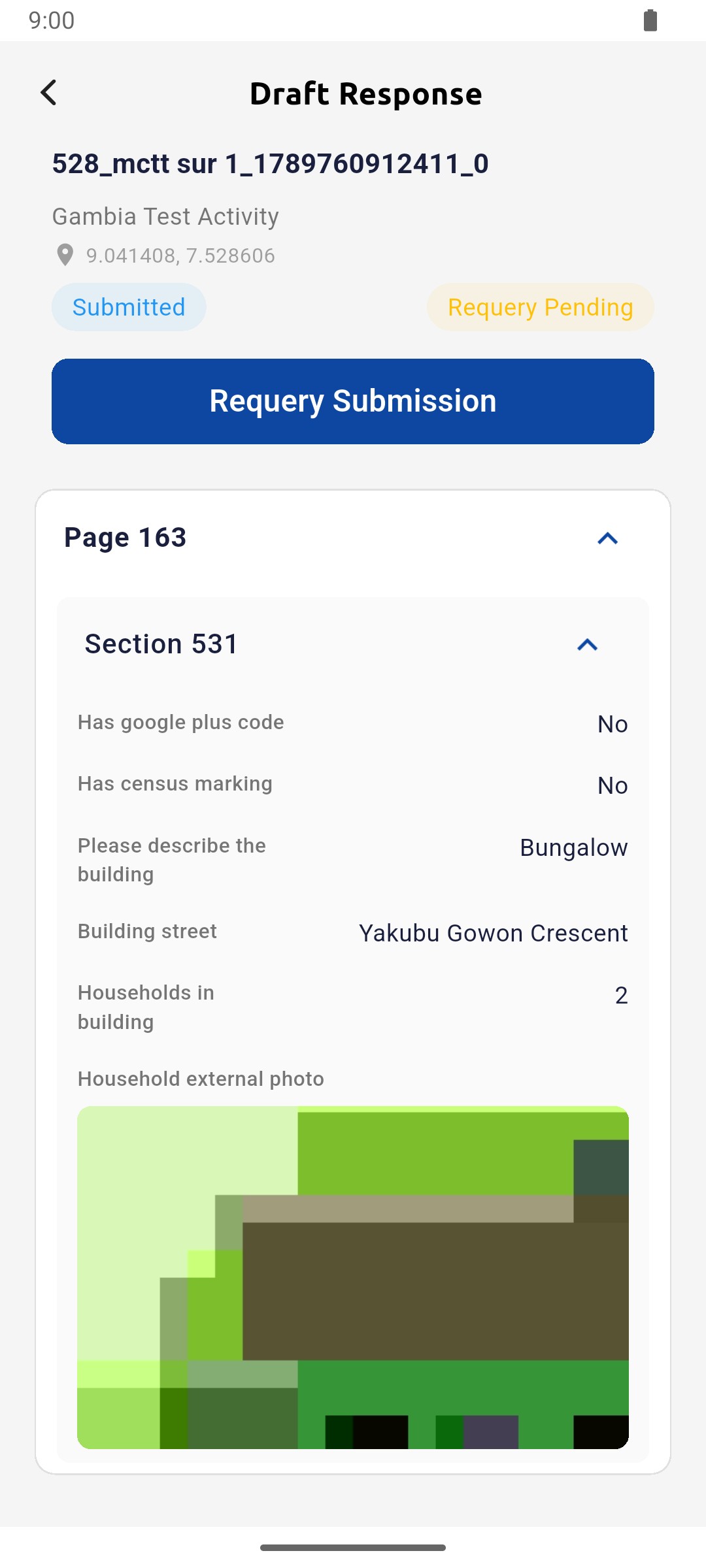 Stored survey showing GPS coordinates, Submitted status, building answers and the photo